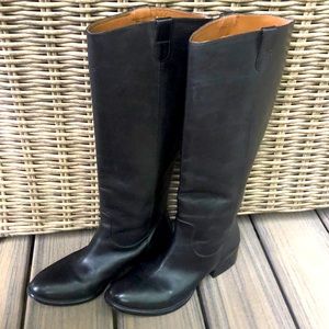 Lightly used Donald J Pliner black knee high leather boots.